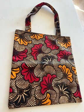 African wax print tote bag crafted from traditional Ankara cotton fabric.